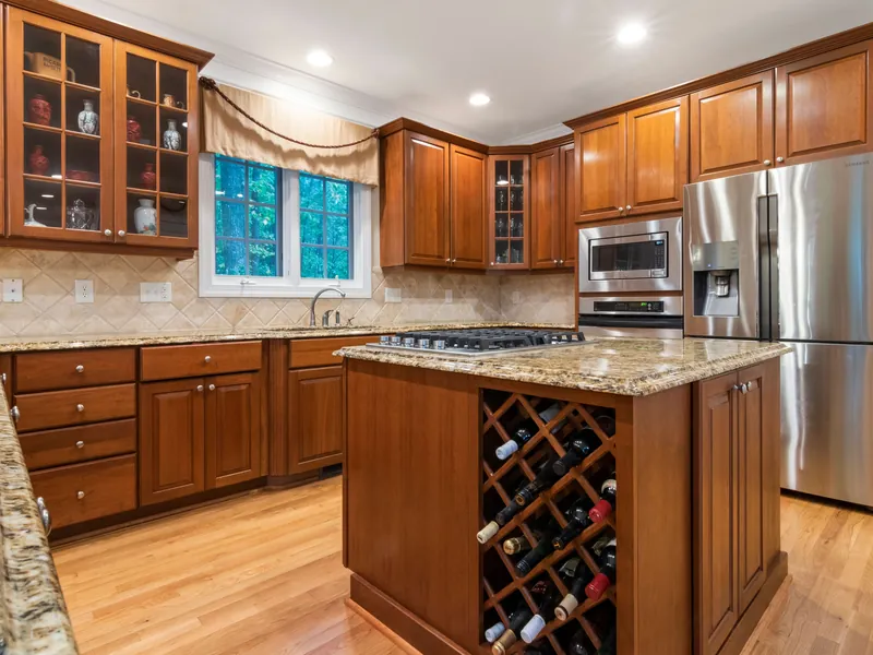Traditional wood kitchen with wine-storage island in the Smokies